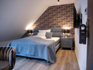 Postel nebo postele na pokoji v ubytování Hotel KUMP365