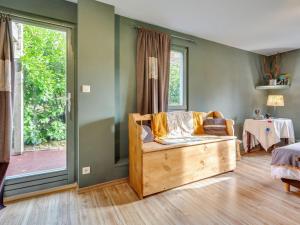 A seating area at Holiday Home in Auvergne with Roofed Garden and Terrace