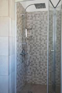 Ванная комната в Ammos 2 - Seafront maisonette, Glyfo beach, Sifnos