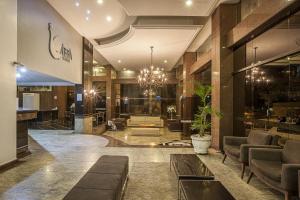 Uma área de estar em Abba Hotel