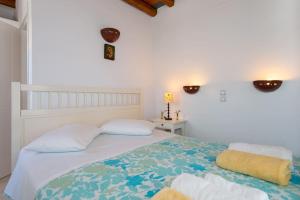 Кровать или кровати в номере Ammos 2 - Seafront maisonette, Glyfo beach, Sifnos