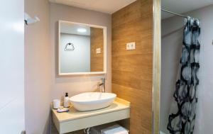 a bathroom with a sink and a mirror at Mijas Sea Views Apartment in Mijas Costa +17 photos