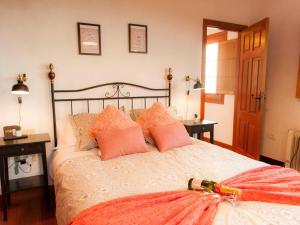 Una cama o camas en una habitación de 4 star holiday home in San Juan de la Rambla