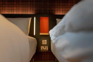 Letto o letti in una camera di easyHotel Dublin