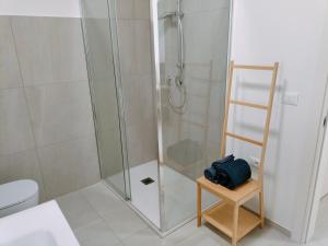 a shower with a glass door in a bathroom at FaCentro - Free WiFi & Air Conditioning in Faenza +16 photos