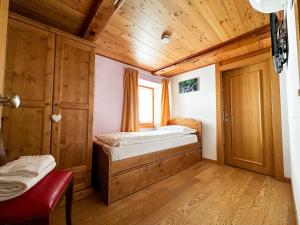 Postel nebo postele na pokoji v ubytování Locanda Orelli