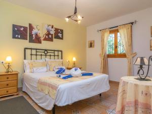 a bedroom with two beds and two tables at Ca Sa Nina - Villa With Private Pool In Inca Free Wifi in Biniamar