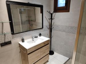a bathroom with a sink and a shower at Casa Divarro in O Grove +22 photos