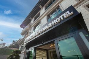 a hotel sign on the front of a building at MFB Tarabya Hotel in Istanbul