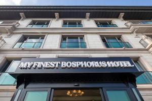 a building with a sign on the front of it at MFB Tarabya Hotel in Istanbul