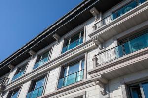 a building with balconies on the side of it at MFB Tarabya Hotel in Istanbul