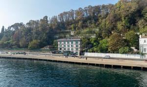 a bridge over a body of water with buildings at MFB Tarabya Hotel in Istanbul