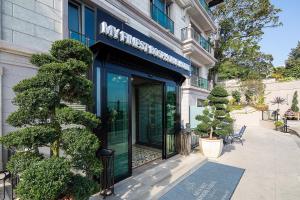 a building with a sign on the front of it at MFB Tarabya Hotel in Istanbul