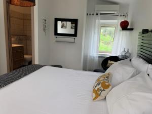 Postel nebo postele na pokoji v ubytování Boutique B&B Dolce Far Niente