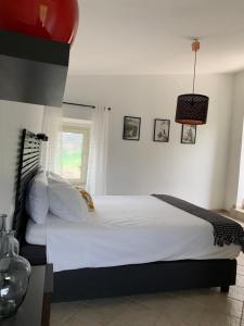 Postel nebo postele na pokoji v ubytování Boutique B&B Dolce Far Niente
