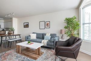 a living room with a couch and a table at South Beach 1br w spa lounge nr baseball park SFO-1665 in San Francisco