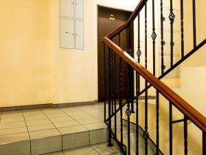 a staircase in a building with a stair case at Sopot Apartament in Sopot