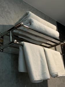 Кровать или кровати в номере Ziyorat Luxury Hotel
