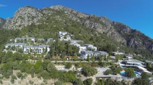 a resort on top of a mountain at Loryma Resort Hotel in Turunç