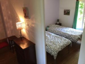 Postel nebo postele na pokoji v ubytování Saint Sever des Pyrenees