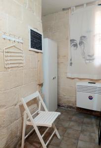 TV a/nebo společenská místnost v ubytování White Suite B&B