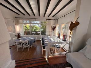 Posedenie v ubytovaní Casa única con jardín a 45 metros de la playa. BE