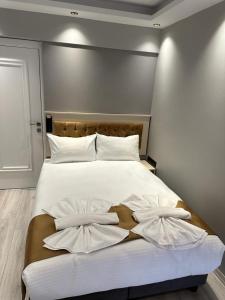 Postel nebo postele na pokoji v ubytování Sareban Hotel Istanbul