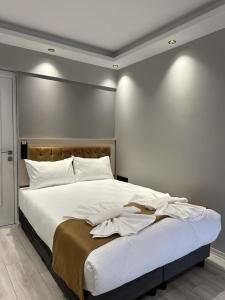 Postel nebo postele na pokoji v ubytování Sareban Hotel Istanbul