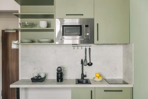 Η κουζίνα ή μικρή κουζίνα στο Homaris Apartments Frankfurt