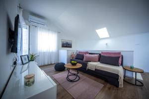 TV a/nebo společenská místnost v ubytování Apartments Mariana