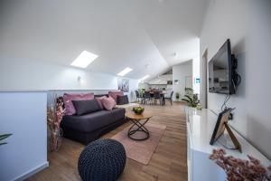 TV a/nebo společenská místnost v ubytování Apartments Mariana