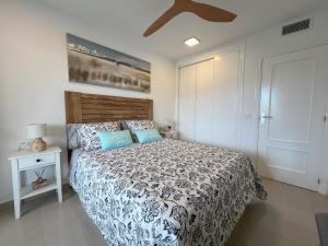a bedroom with a bed and a ceiling at Gemelos 24 Cala de Finestrat. Luxury Apt. in Benidorm +72 photos