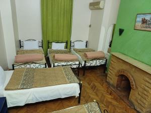 Voodi või voodid majutusasutuse Meramees Hotel toas