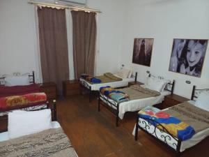 Voodi või voodid majutusasutuse Meramees Hotel toas