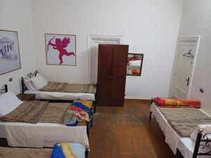 Voodi või voodid majutusasutuse Meramees Hotel toas