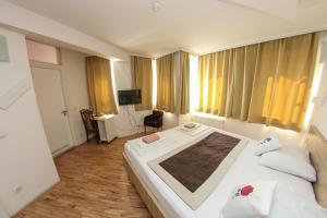 Letto o letti in una camera di Hotel Hayat