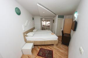 Letto o letti in una camera di Hotel Hayat