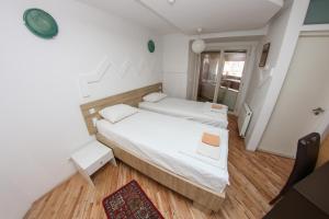 Letto o letti in una camera di Hotel Hayat
