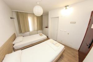 Letto o letti in una camera di Hotel Hayat