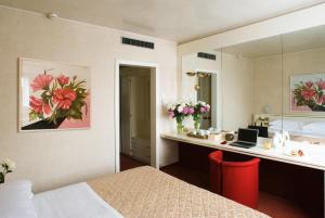 Posteľ alebo postele v izbe v ubytovaní Starhotels Cristallo Palace + 36 fotografií