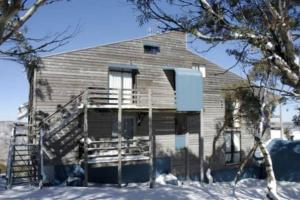 a house in the snow in front at Shamrock Apartment 9 - Mount Hotham in Mount Hotham