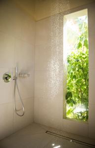 Un baño de Zanzibar White Sand Luxury Villas & Spa - Relais & Chateaux