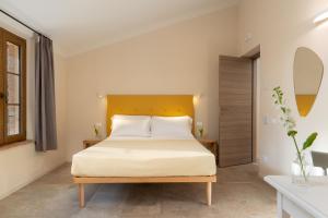 Agriturismo Tenuta i 4 venti客房内的一张或多张床位