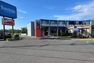 an empty parking lot in front of a hotel at Travelodge by Wyndham Aberdeen in Aberdeen