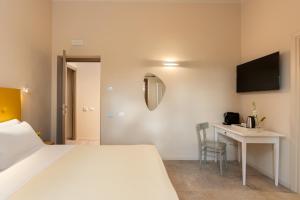 Agriturismo Tenuta i 4 venti的电视和/或娱乐中心