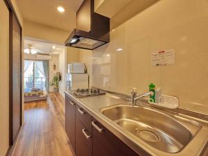 Η κουζίνα ή μικρή κουζίνα στο Yukurina Resort Okinawa +37 φωτογραφίες