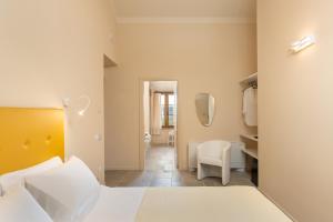 Agriturismo Tenuta i 4 venti客房内的一张或多张床位