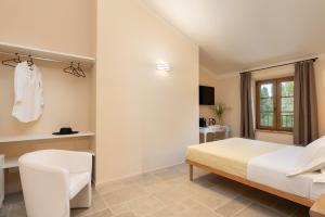 Agriturismo Tenuta i 4 venti客房内的一张或多张床位