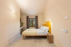 Agriturismo Tenuta i 4 venti客房内的一张或多张床位