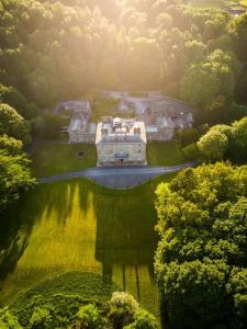 an aerial view of a house in the middle of a lake at Victorian Copper Cottage in Lancaster